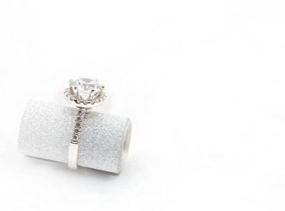 Solitaire ring that signifies a traditional with a hint of modernism.