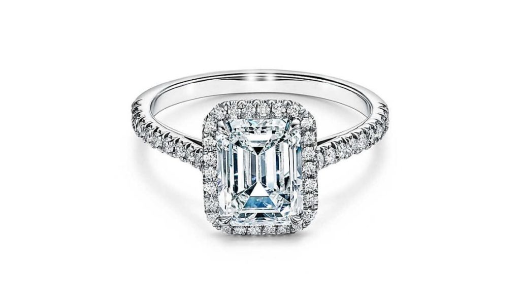 Emerald cut halo engagement ring